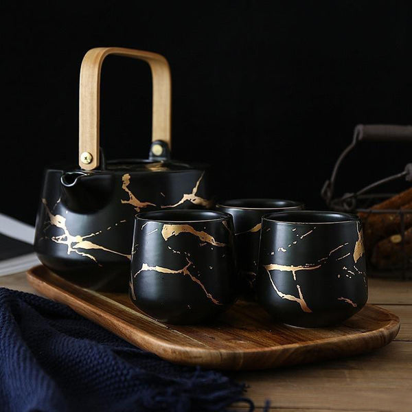 https://bunkajapan.com/cdn/shop/products/Japanese-Kintsugi-Tea-Cups-Set-Black-Color-Demo-495307_grande.jpg?v=1637994250